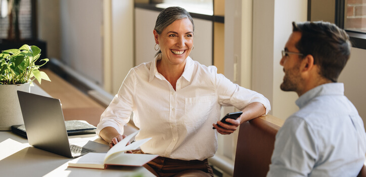 Senior businesswoman meeting with partner