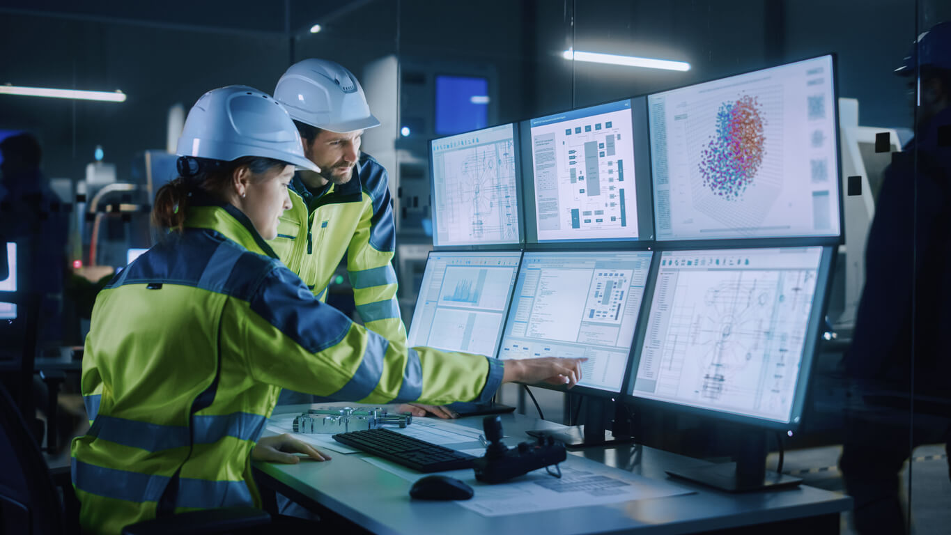 Industry 4.0 Modern Factory: Project Engineer Talks to Female Operator who Controls Facility Production Line, Uses Computer with Screens Showing AI, Machine Learning Enhanced Assembly Process Giving Facebook the thumbs down