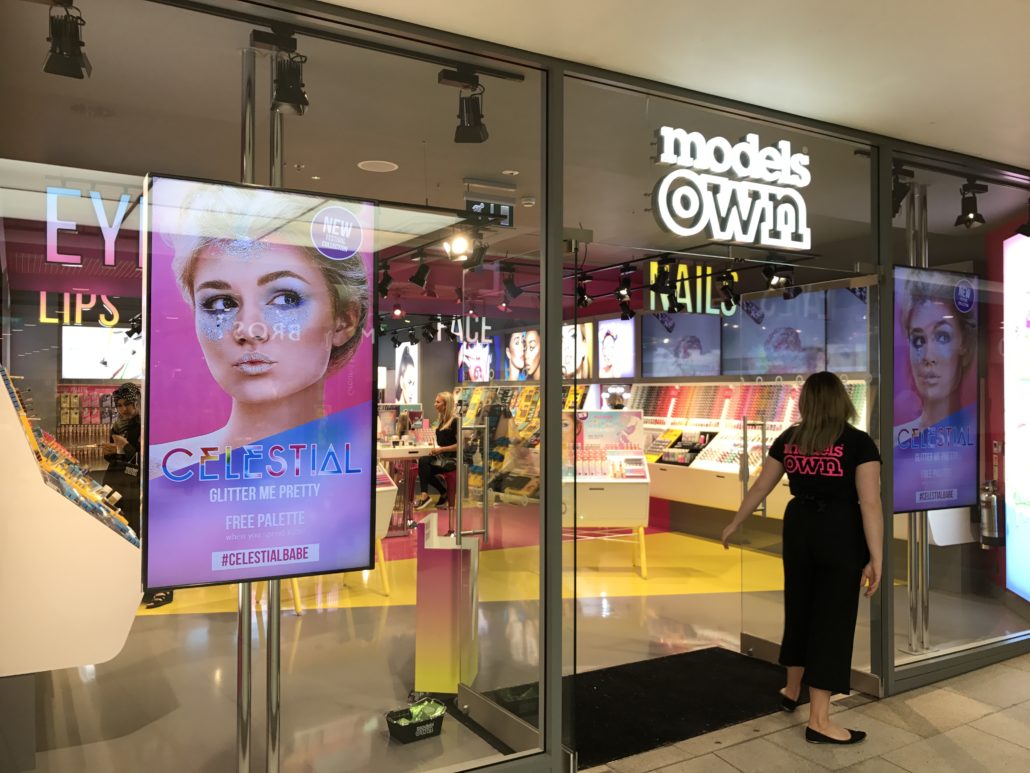 Digital Signage on the storefront of Models Own