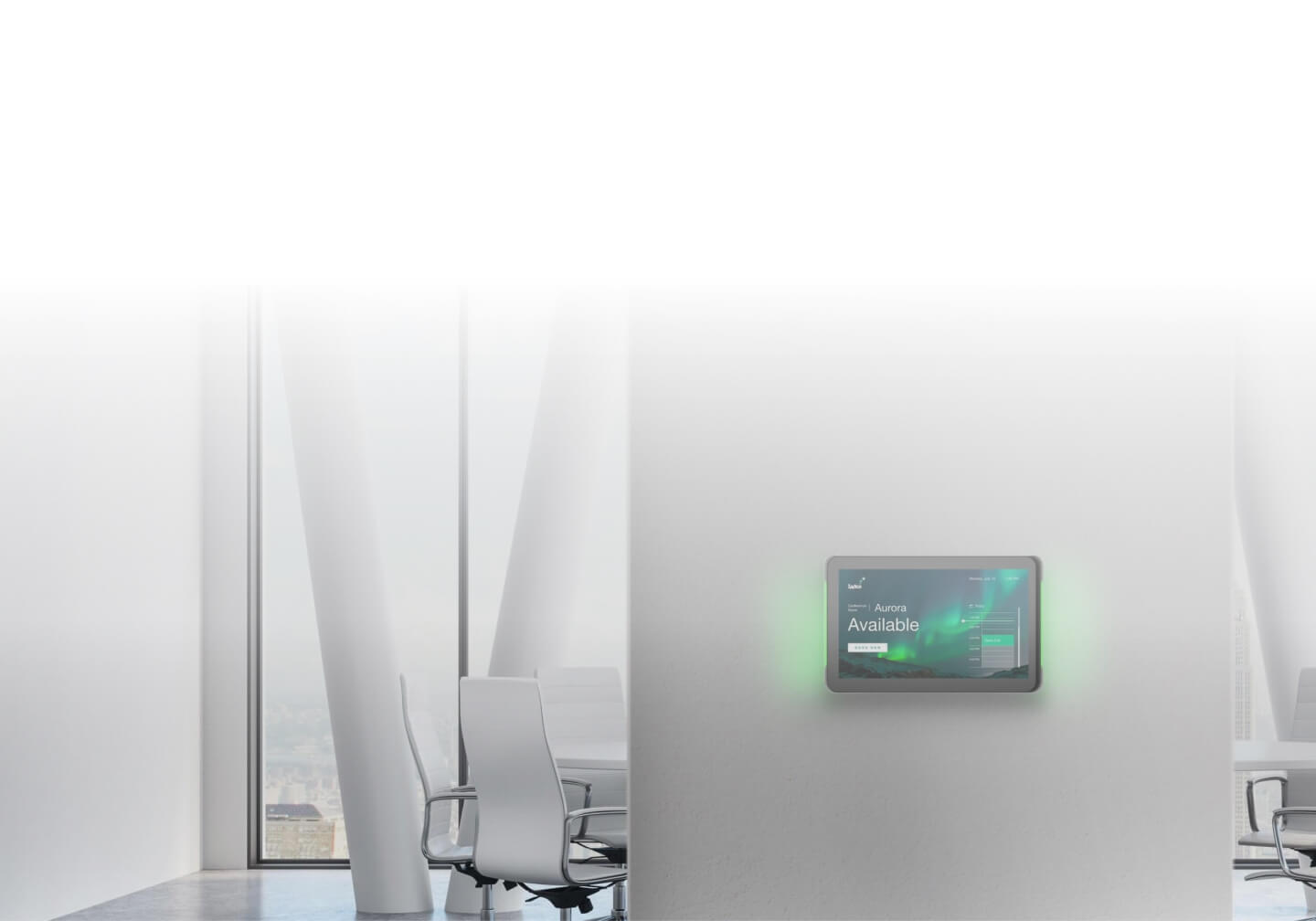 IAdea room booking panel on a meeting room wall, glowing green to show the room is available