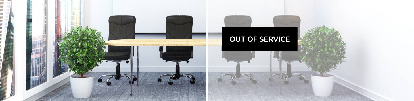 The same meeting room shown twice, the second view faded with an Out of Service sign across the table